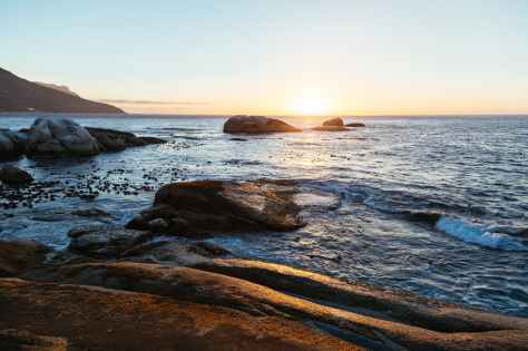 sea waves crashing on rocks
