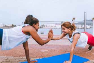 two woman doing exercise